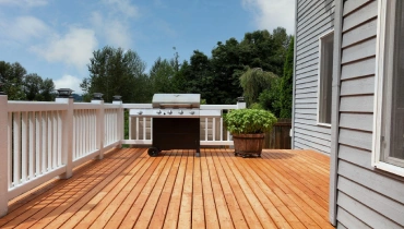 Image of stained exterior wooden deck.
