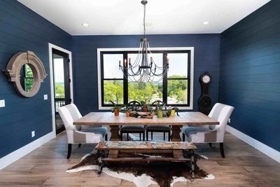 Gorgeous dining room with blue and white interior paint job.