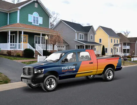 A Five Star Painting truck in front of a house