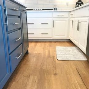 kitchen with two-toned cabinetry.