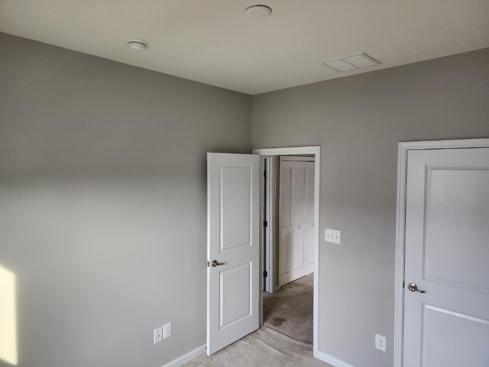 Updated Bedroom with Grey Walls, High Contrast White Ceiling and High Contrast White Trim