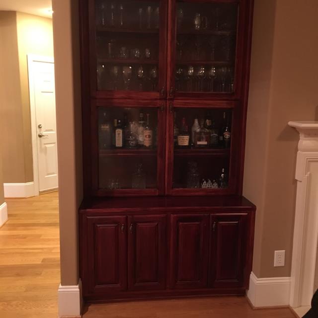 Dark wood dish cabinet