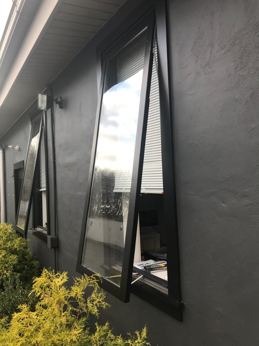 Commercial Building dark gray stucco black windows