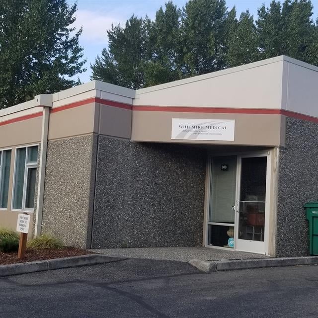 Commercial Complex with cement and pebble rock siding