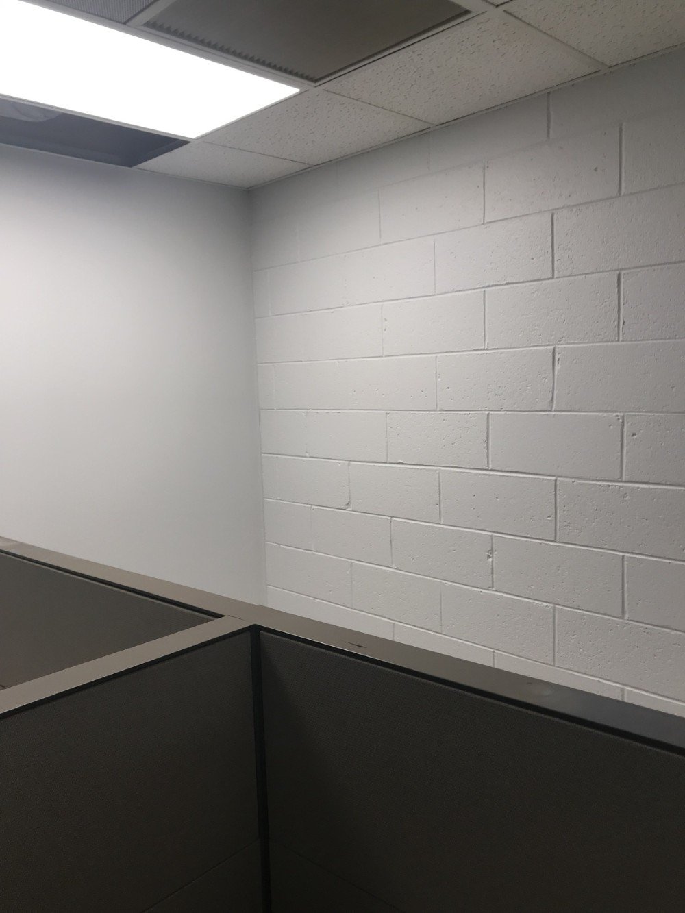 white painted concrete interior walls commercial building