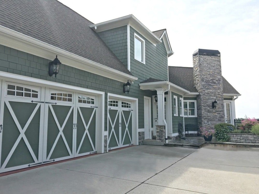 Freshly painted cedar-sided house showcasing vibrant colors and impeccable craftsmanship by our Five Star Painting residential and commercial painting experts in Johnson City, TN.