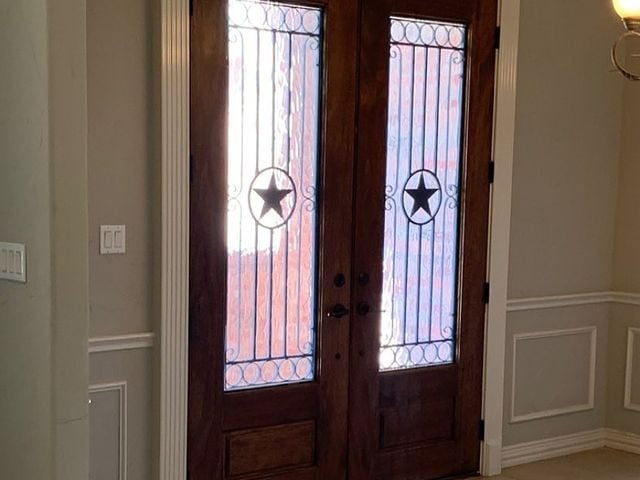 Brown front door with glass