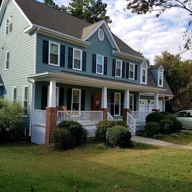 Full exterior view of a charming two-story home, showcasing the flawless paintwork provided by our Five Star Painting services in Mars, PA