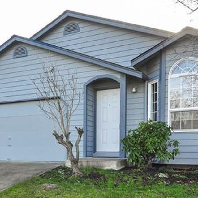 Single Story Home with Double Car Garage and Front Door