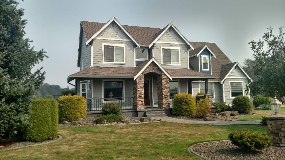 Two Story Home with Accent Peaks, front porch with railings