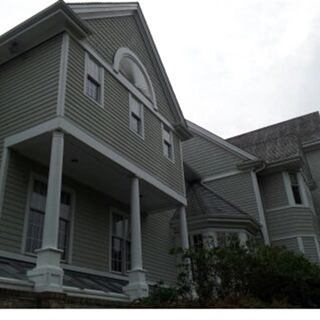 Painted Grey Shaker Siding Exterior with High Contrast White Trim