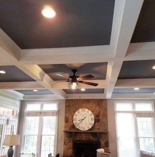 coffered ceiling and accent wall