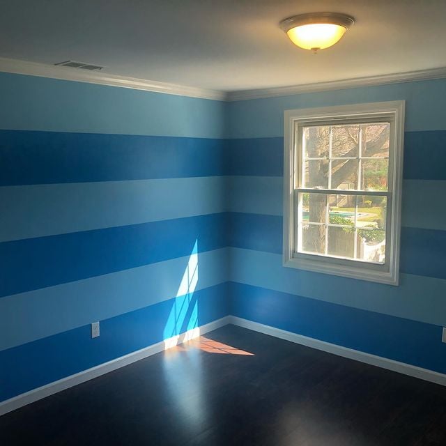 Blue striped painted bedroom