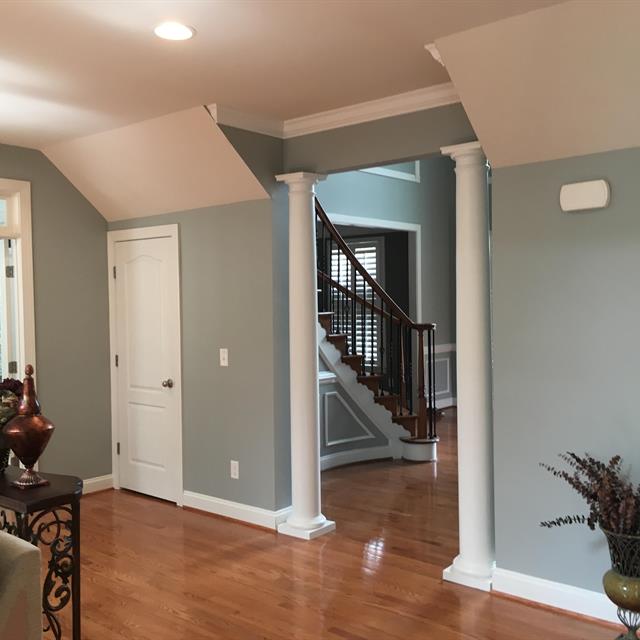 Contrasting Interior White Ceiling and Columns with Grey Walls