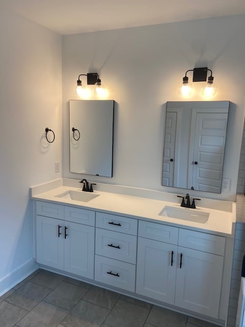 Interior master bathroom Sherwin Williams SW7005 Pure White flat on walls, SW7005 Semi Gloss on trim Auburn Alabama.