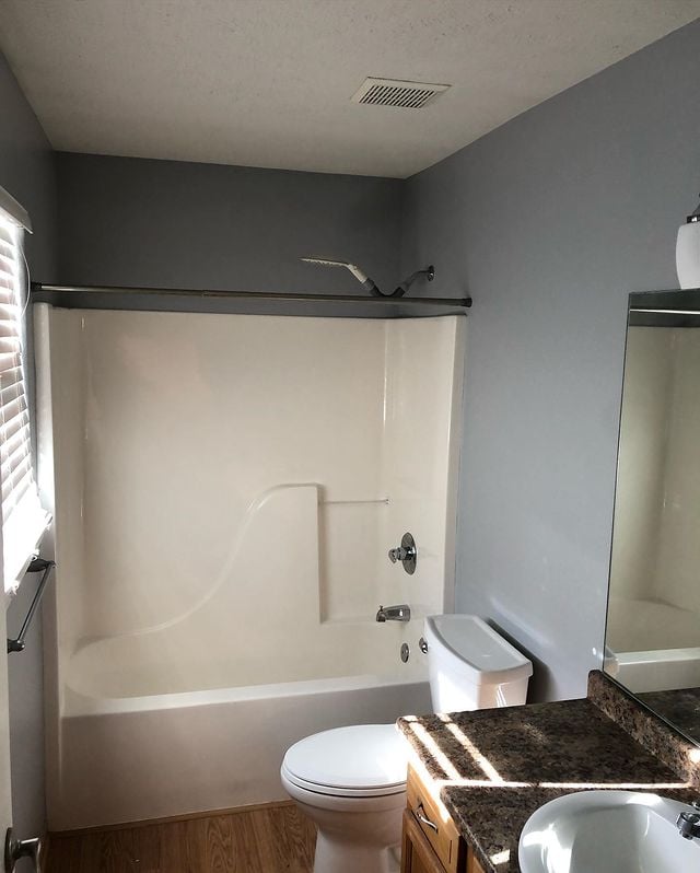 Interior painting in bathroom with deep grey