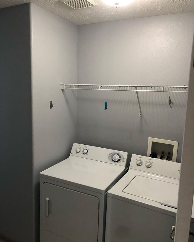 Interior painting in laundry room with hung shelf