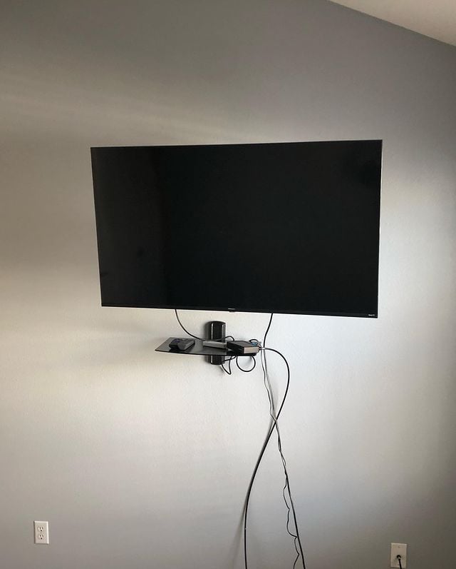 Interior painting with TV mounted on wall