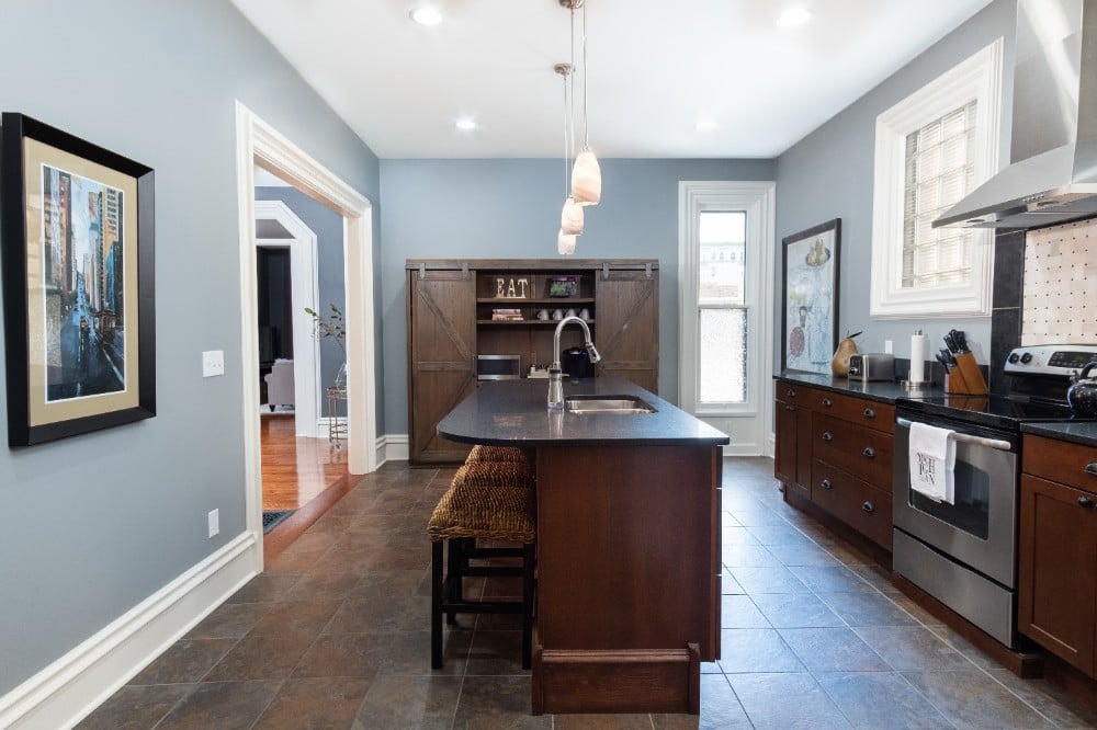 Transformed kitchen space featuring expertly painted walls, cabinets, and trim, showcasing the exceptional craftsmanship of our Five Star Painting services in Pittsburgh, PA