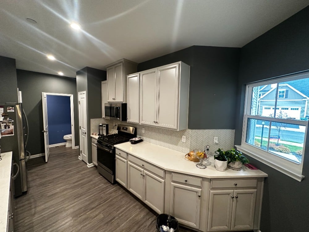 This stunning kitchen was transformed by the professionals at Five Star Painting of Wexford into a bold and modern kitchen. The walls, cabinets, ceiling and trim were precissionly painted in this upscale Cranberry, PA home.