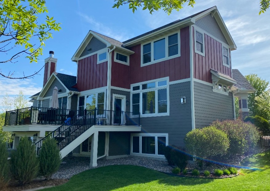 Red and brown house with cream trim