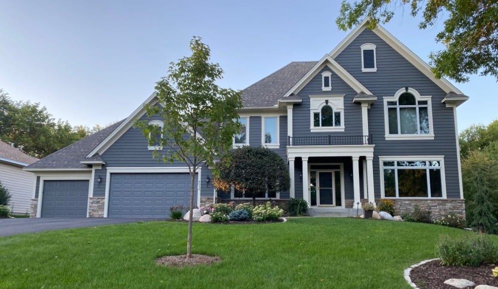 Dark gray house with cream trim