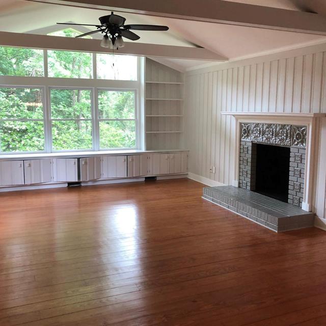 Living room white wash fireplaceWe services Raleigh, Durham, Chapel Hill, Wake Forest, Brier Creek, Hillsbourough, Pittsboro, Rolesville with Sherwin Williams, Ben Moore paints for Interior, cabinets, & commerical