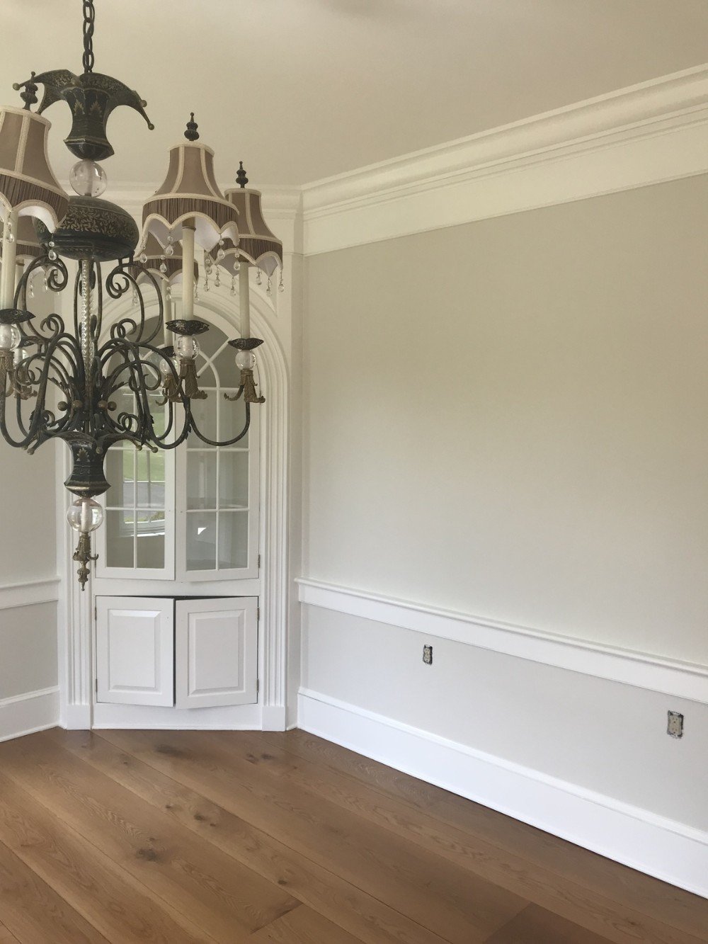 tan walls white trim brown wood floors crystal chandler