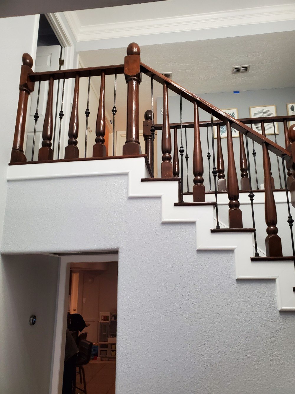 Interior Stained Stairs with Extra White Trim.