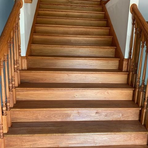 Stained wooden stairwell custom match