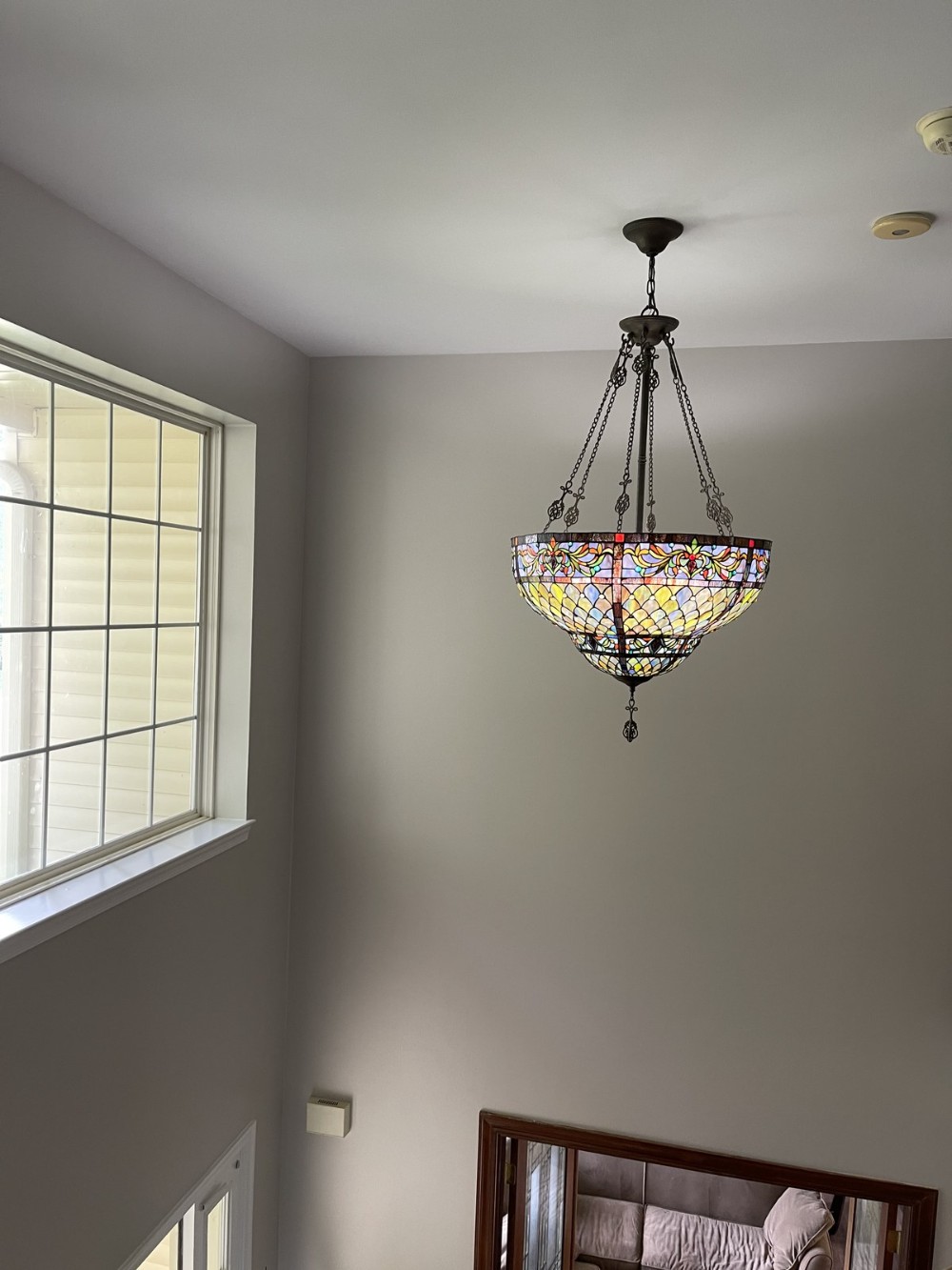 Two Story Foyer light gray walls