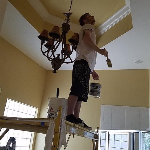 Walls and ceiling being repainted yellow