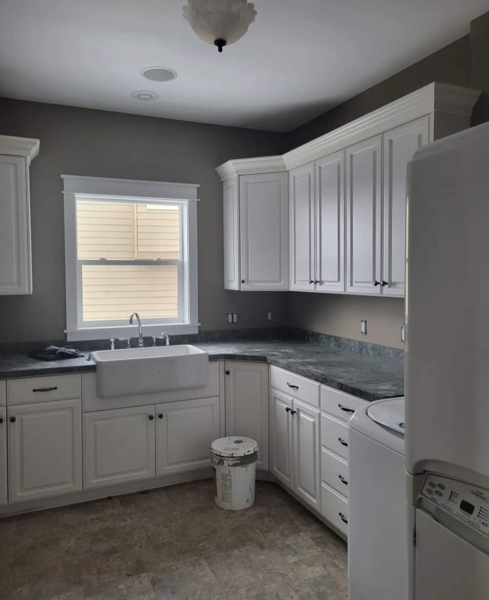 White cabinets, cabinet painting, painted white cabinets, interior painting, residential painting, gray walls, white trim