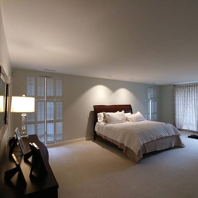 bedroom with white walls