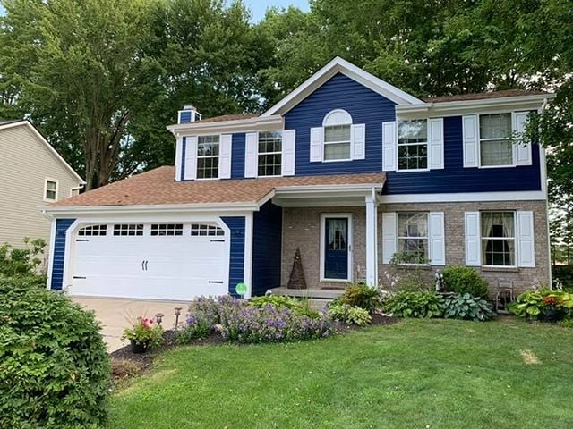 blue house with white accents