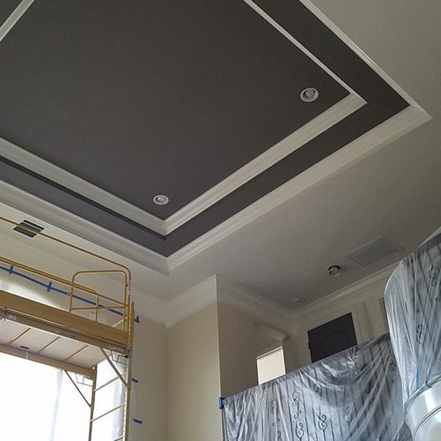 brown ceiling during the repainting process