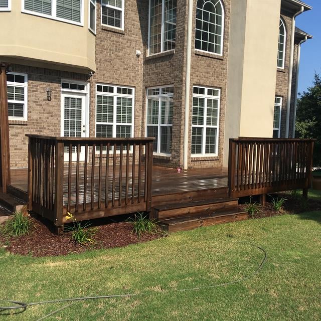 exterior home with stained deck 