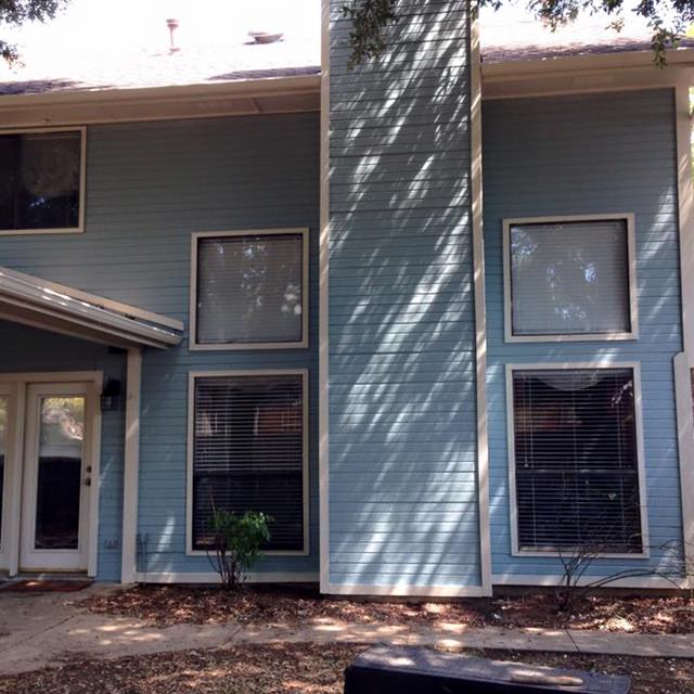 front of home with blue siding