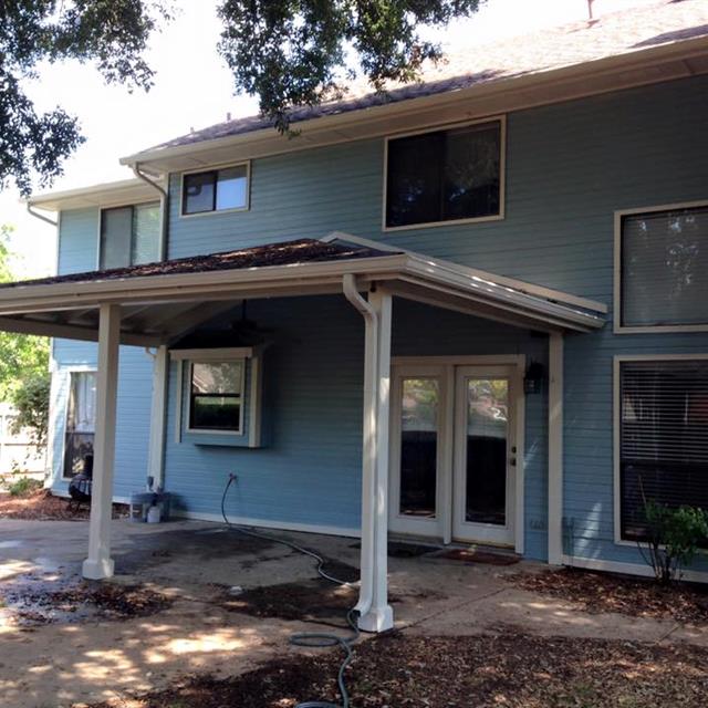 front of home with blue siding