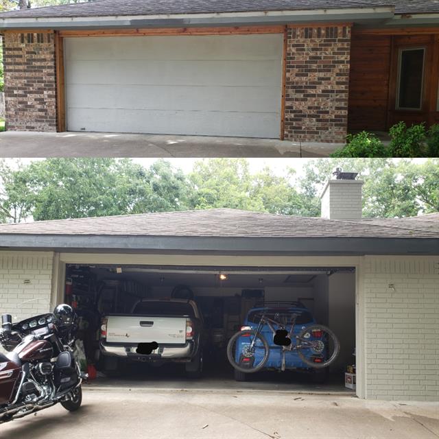 garage open with two cars and a motorcycle