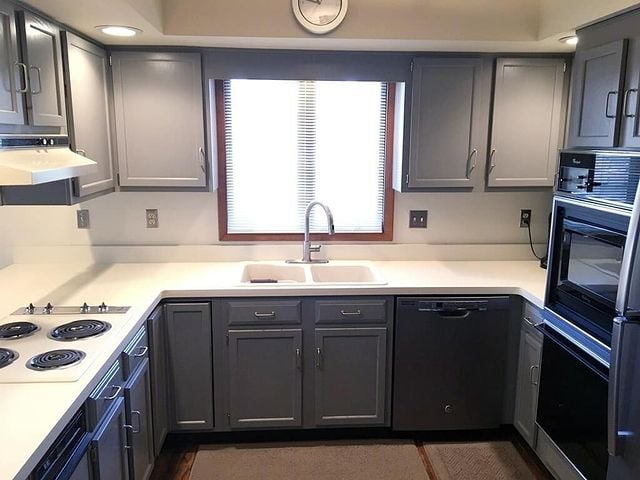 gray cabinets with white counter tops