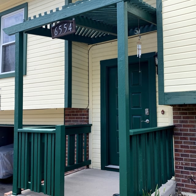 green door and green railing