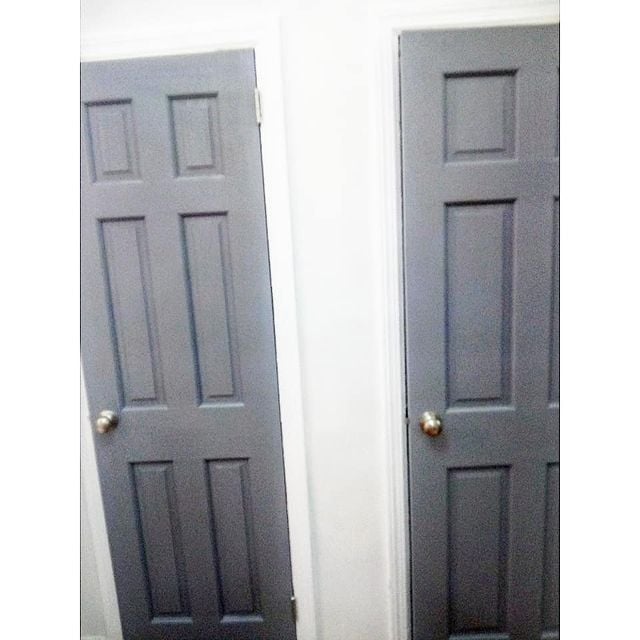 grey doors on a white wall