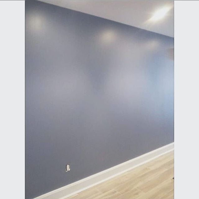 grey wall with white moldings