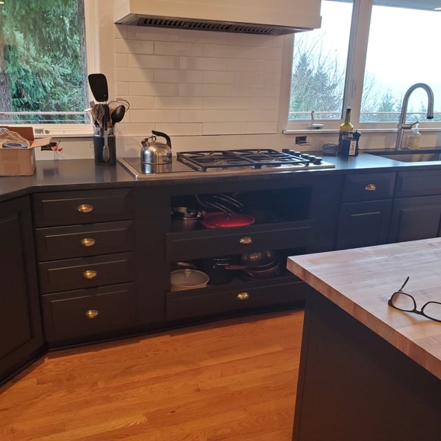 home kitchen with black cabinets