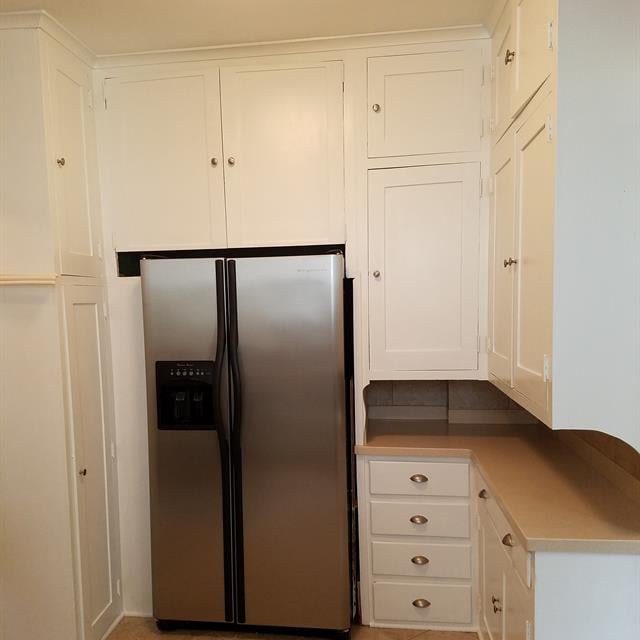 kitchen with white cabinets