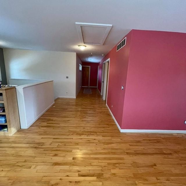 pink and grey wall with white moldings