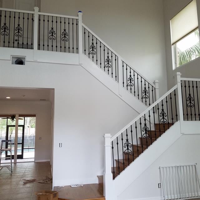 staircase with white walls