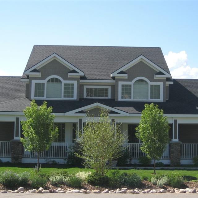 two story home painted gray