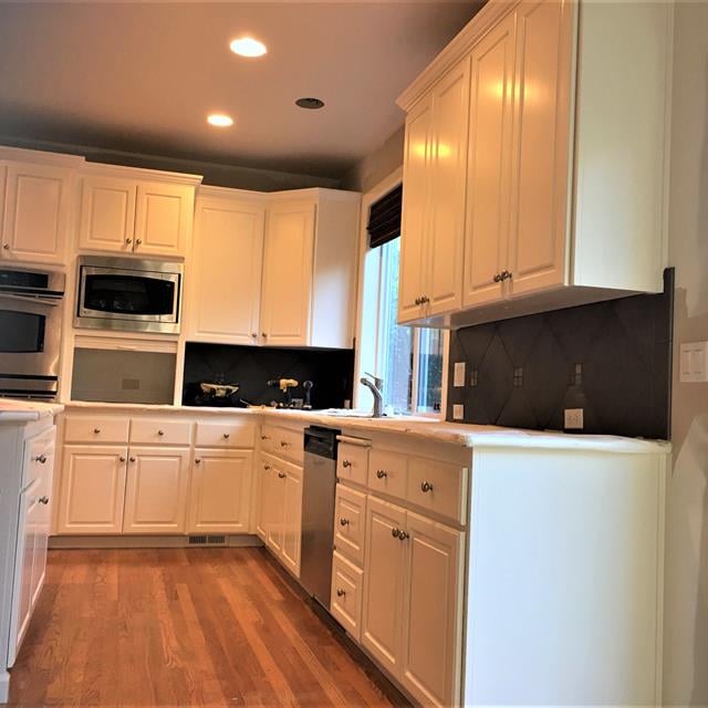 updated kitchen with white cabinets